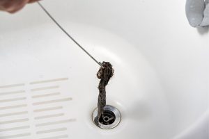 Tips For Removing Hair Clogs In Your Drain