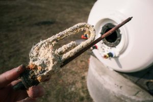 hard water mineral sediments in a water heater