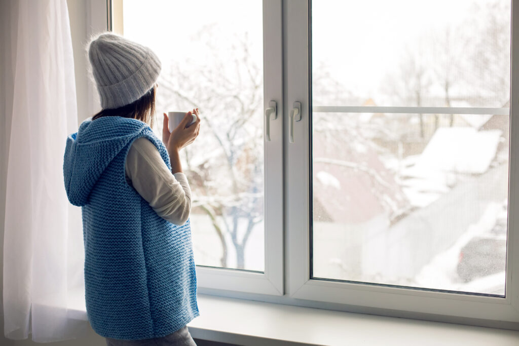 Cozy home scene in Zimmerman with fresh winter air and a warm indoor environment, showcasing indoor air quality solutions.